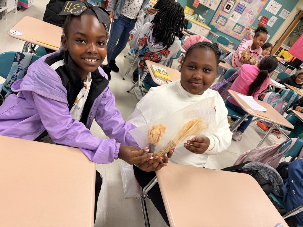 Students exploring Native American Artifacts