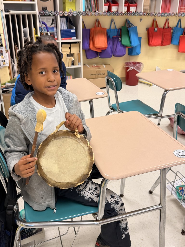 Students exploring Native American Artifacts