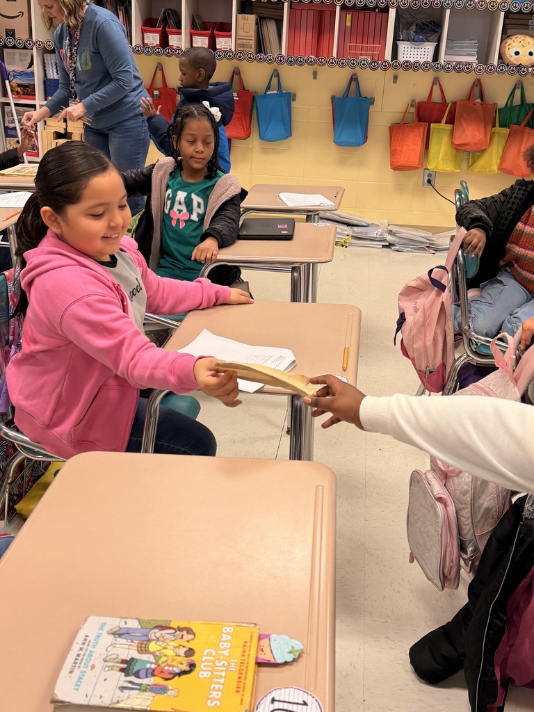 Students exploring Native American Artifacts