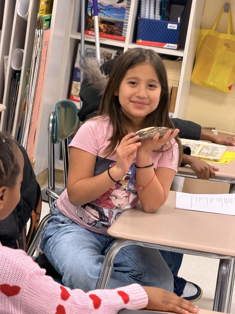 Students exploring Native American Artifacts