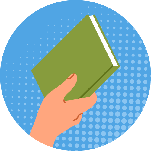 A hand holds up a book