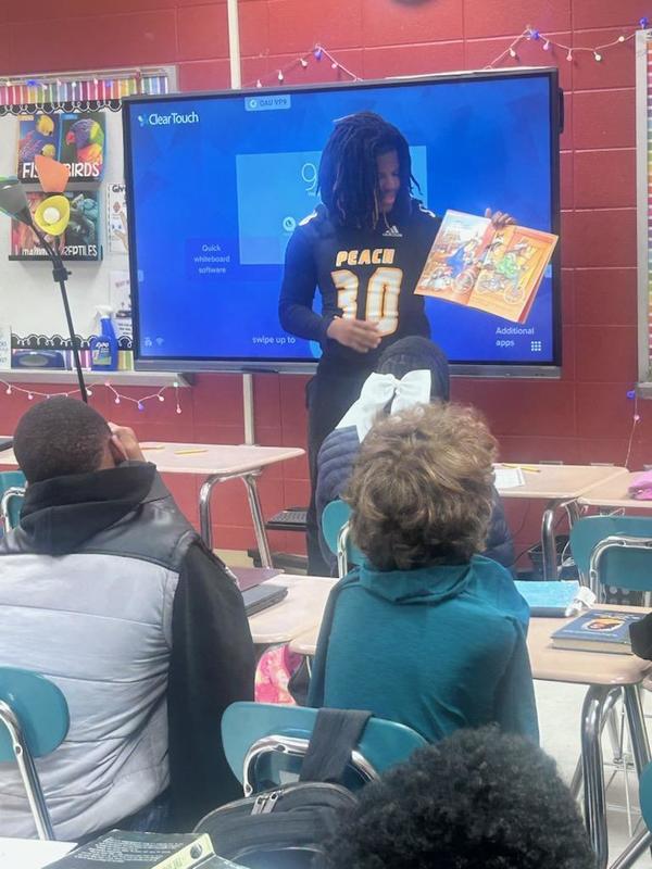 PCHS student participating in read Across America