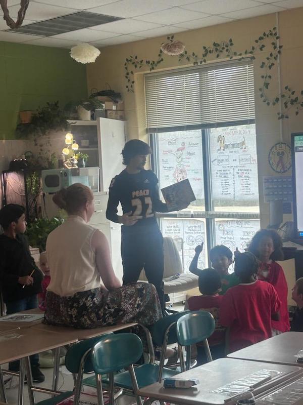PCHS student participating in read Across America