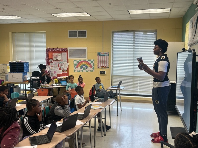 PCHS student participating in read Across America