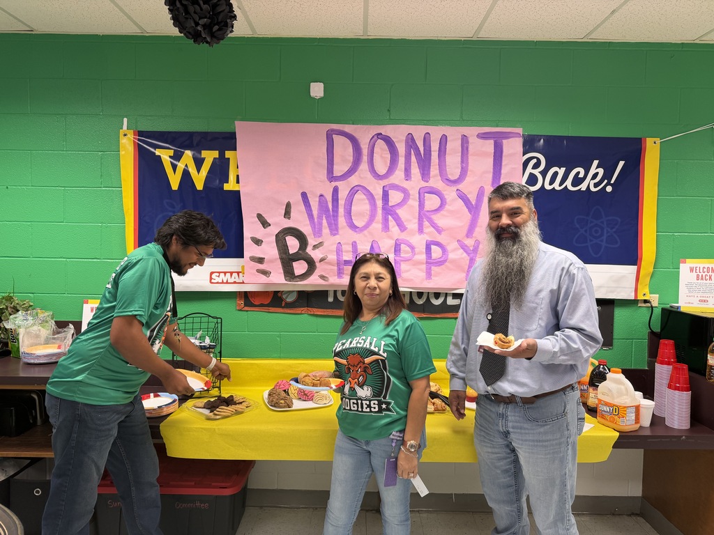 faculty and staff of PJH celebrating earning a B rating at breakfast