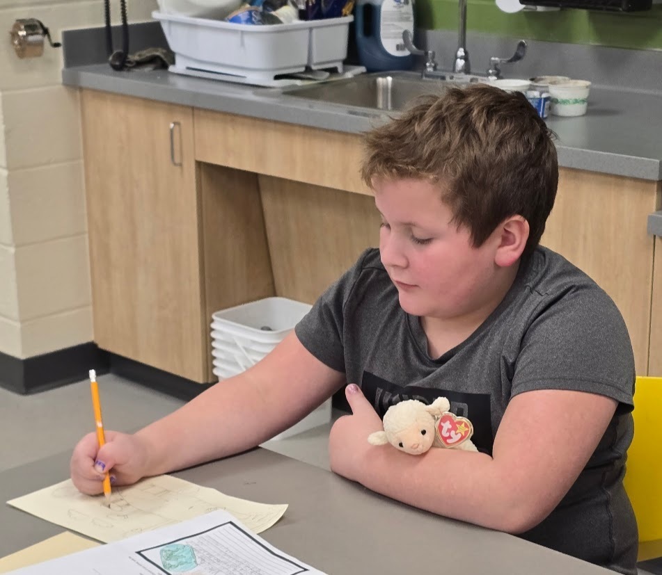 Our 3rd Grade artists have officially become zoologists. 🐾🎨 Each student was offered a position at the Pec School Zoo, where they selected an animal to research and design an appealing habitat for. Using what they learned in their science habitat unit, students answered questions about their animal’s species, country of origin, and care needs. They then applied that research to create a detailed habitat enclosure and wrote an information plate describing their animal.