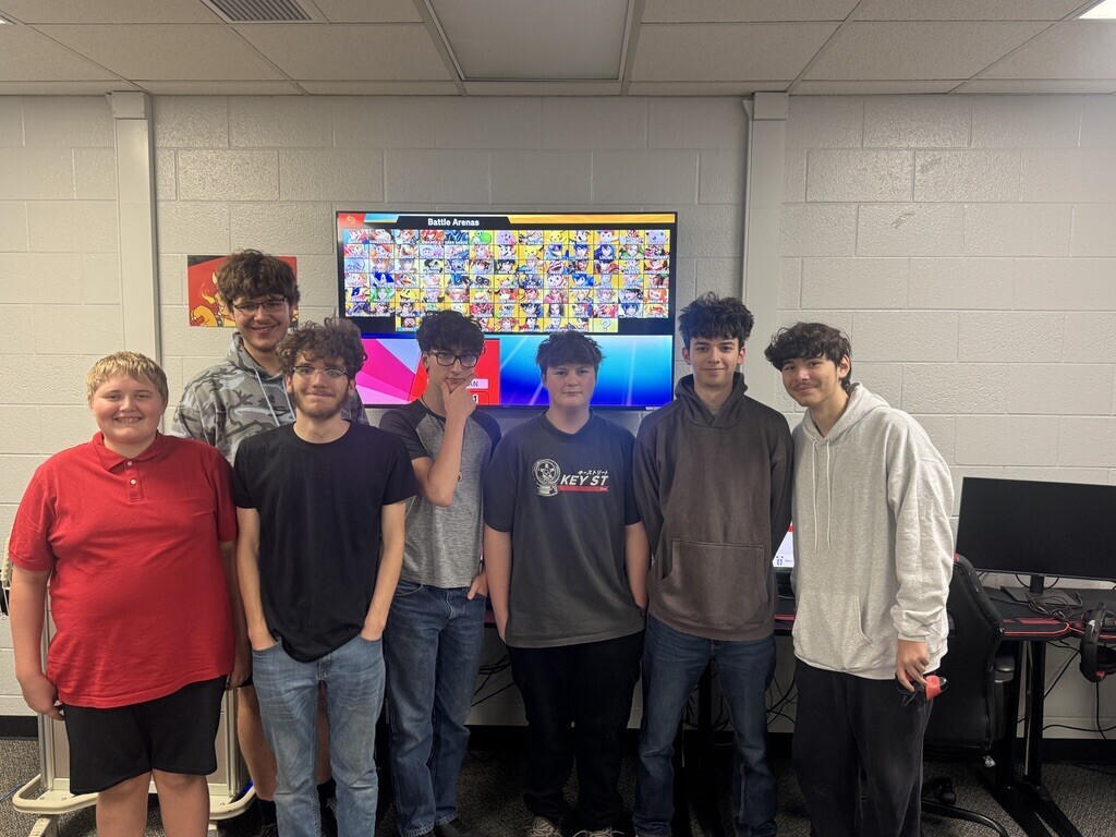 The 2026-27 E-Sports varsity Smash Brothers Crew with team members from L to R: Wyatt Smith, Eli Pohlman (back), Caleb Anderson, Logan Anklam, Carson Tesluck Kaden Llerenas, and Kyle Mayer