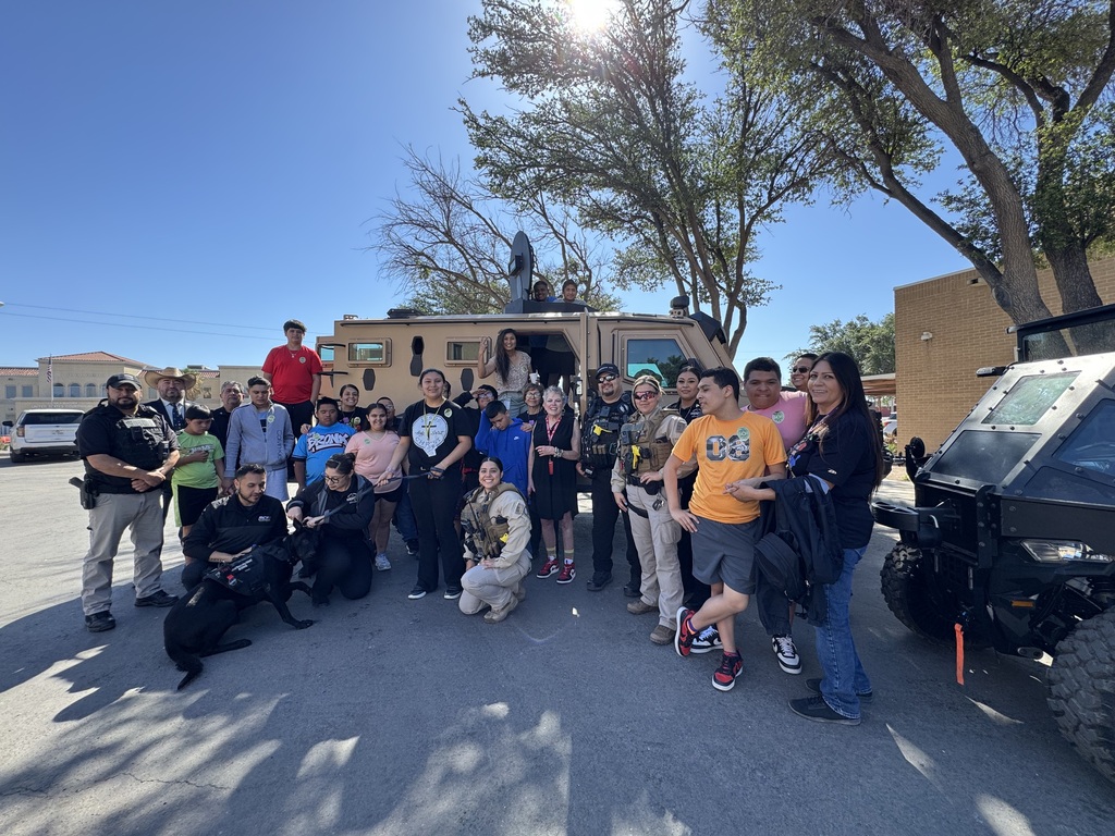 CMS students with the sheriff's office staff in front of a tank truck