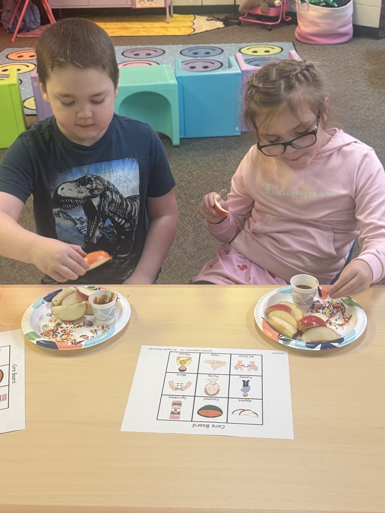 Students tasting apples