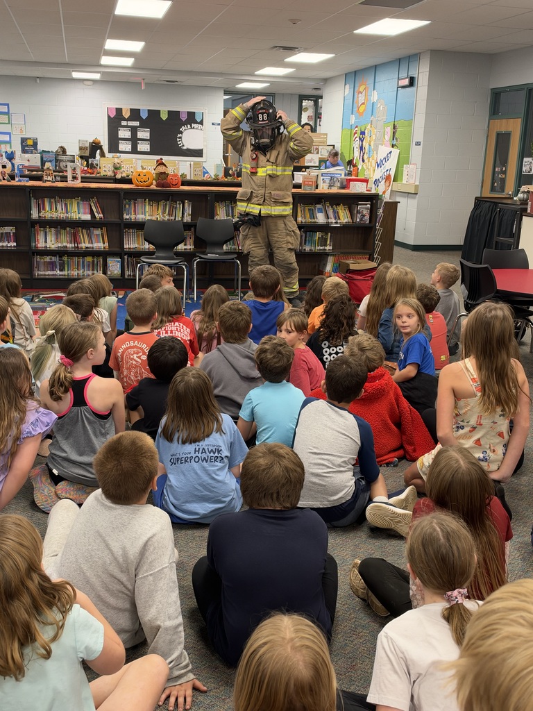 Students watch a fire safety presentation