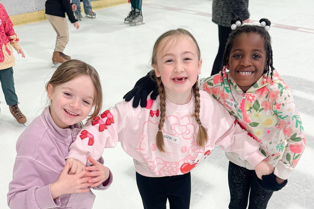 Kindergarten students ice skating