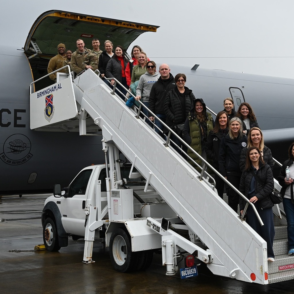 Administrators on plane entry stairs