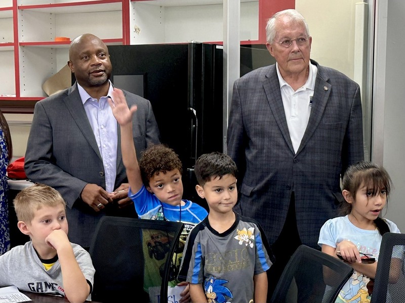 Students with legislators in the YMCA classroom