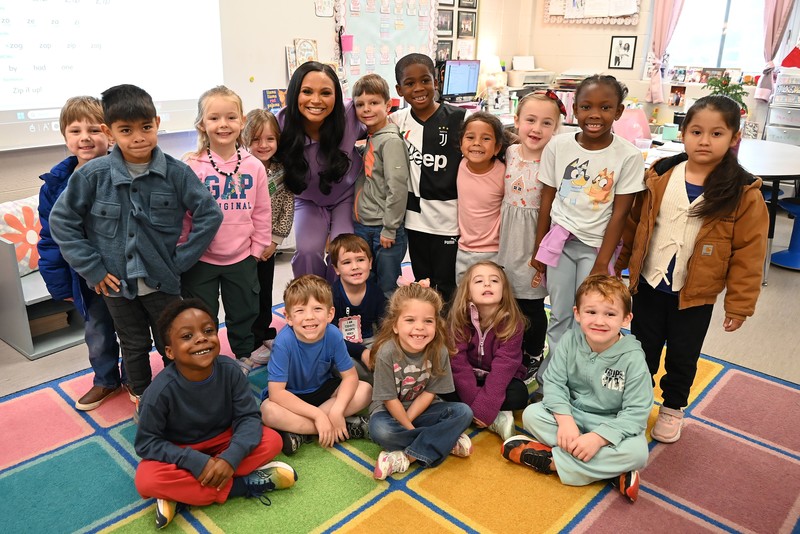 Pelham Oaks teaher of the year with students