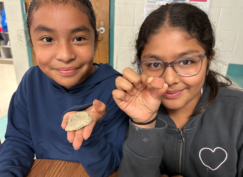 Girls holding "fossils"