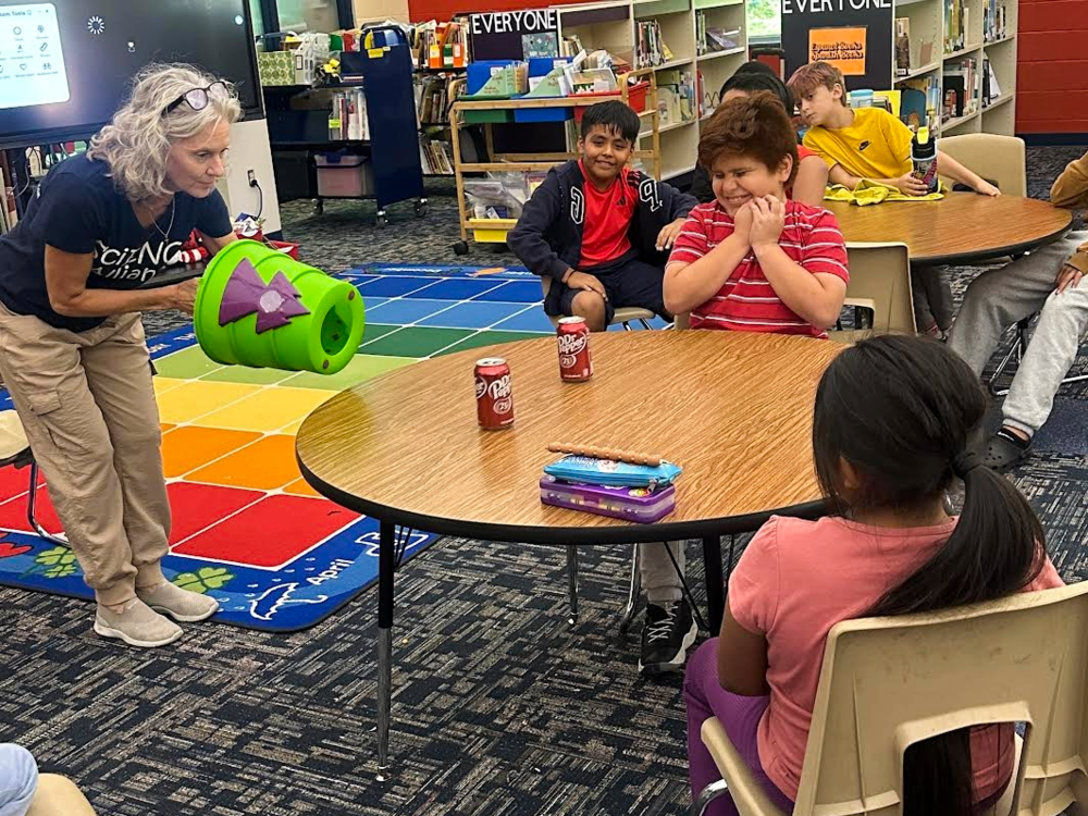 Students watching experiment
