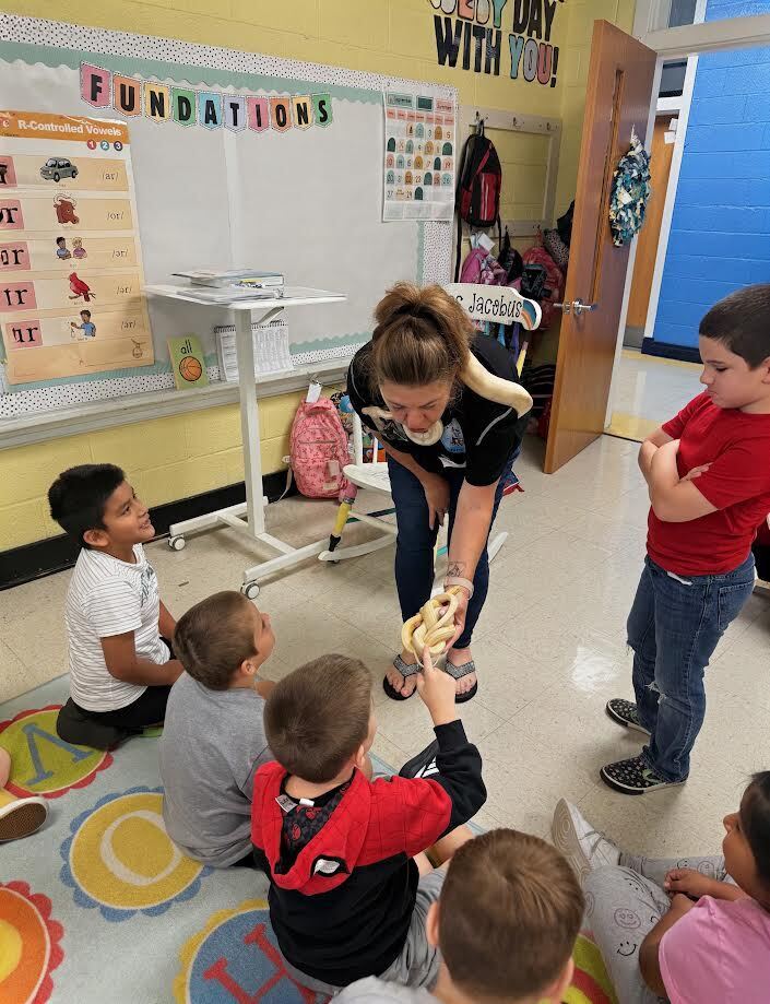 Students with pet snake