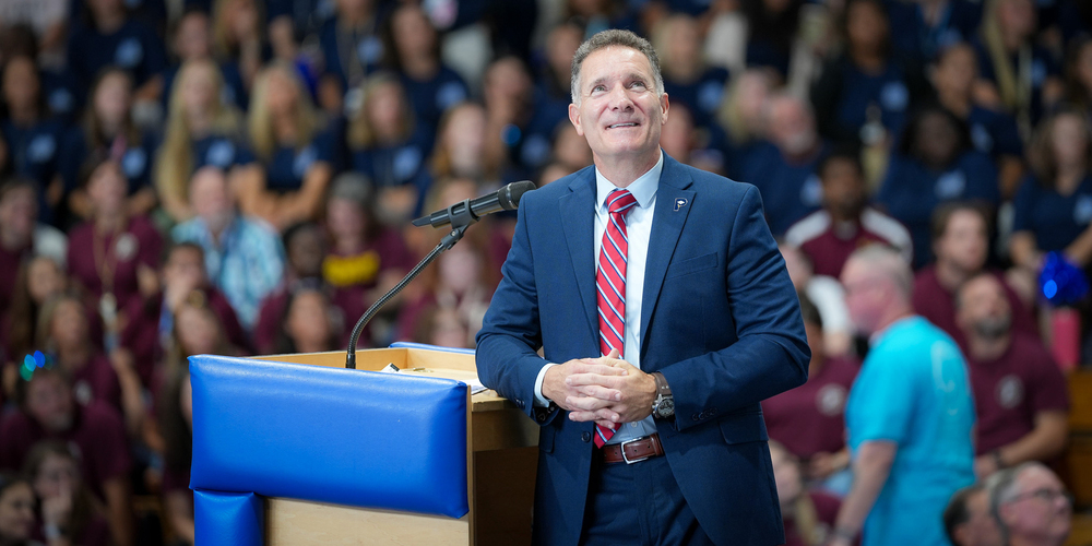 dr. brad breedlove at podium during convocation