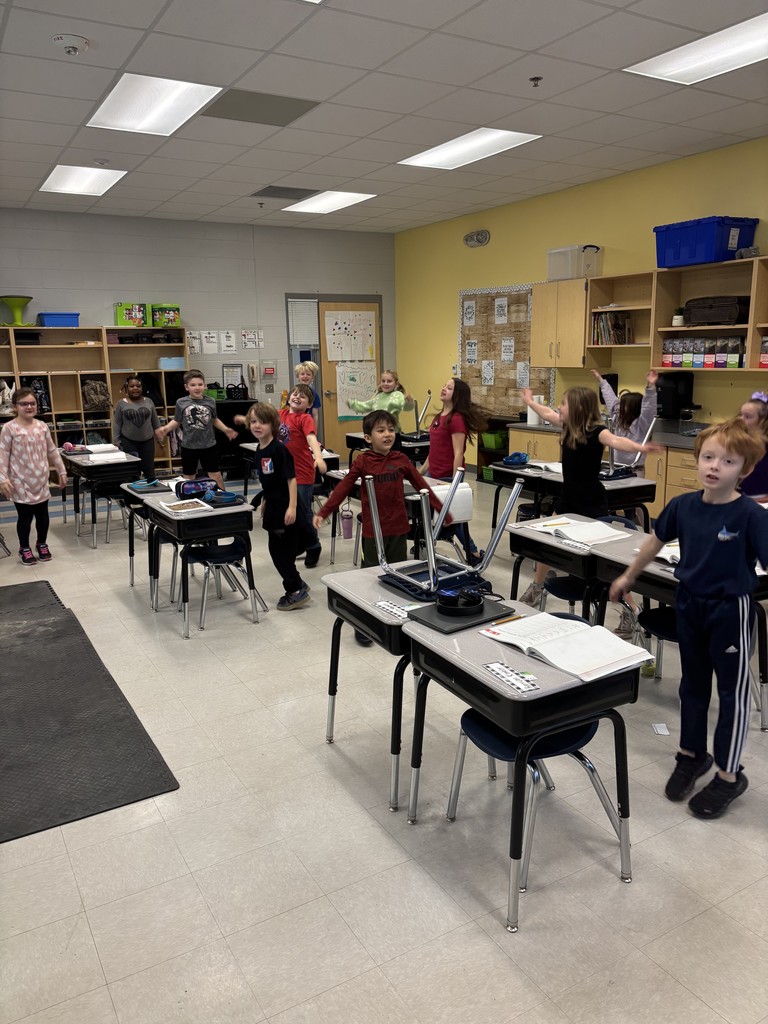 2nd graders measuring units of time by estimating how long it takes to do different activities.