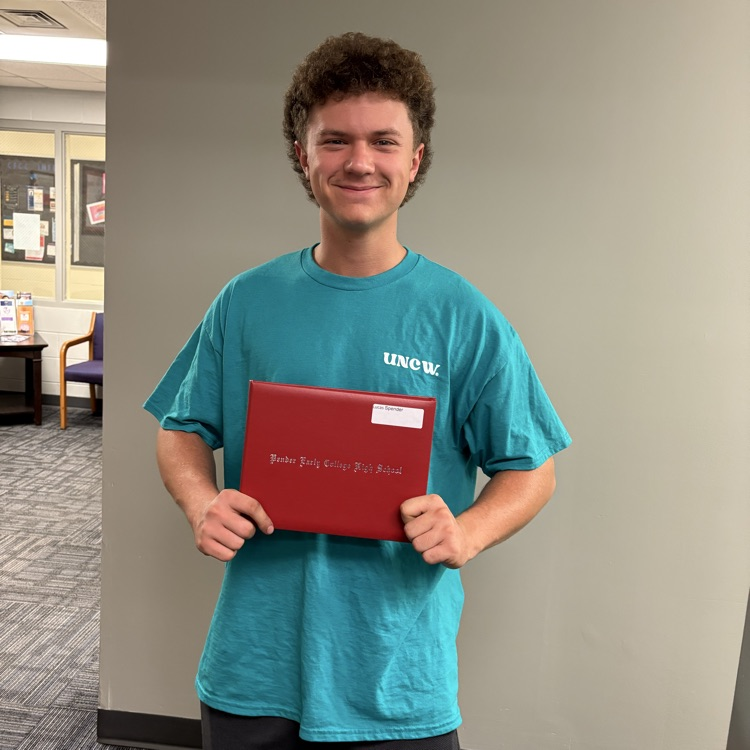Lucas Spenser with diploma