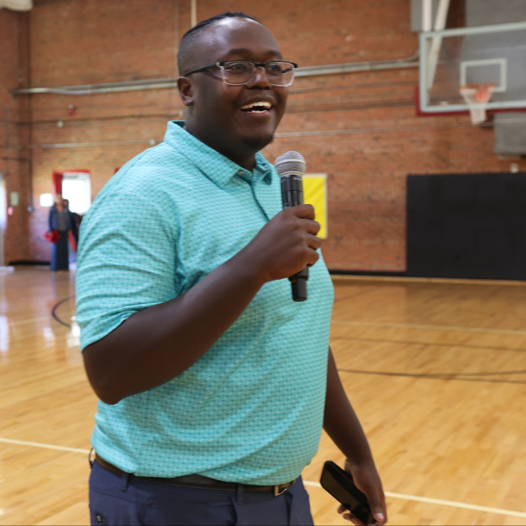 staff member holding microphone