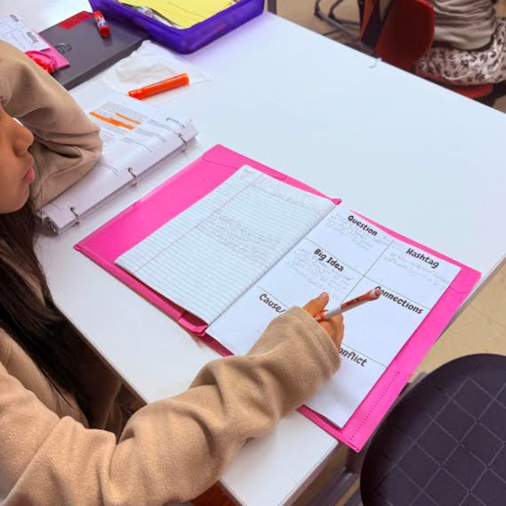 student working on assignment in classroom