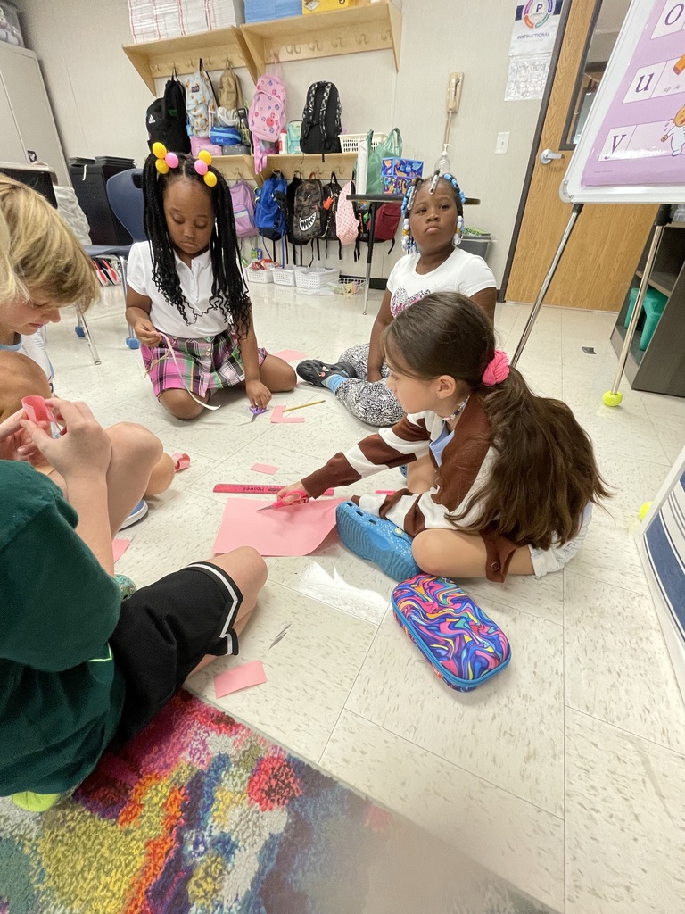 3rd graders working on a project in small groups