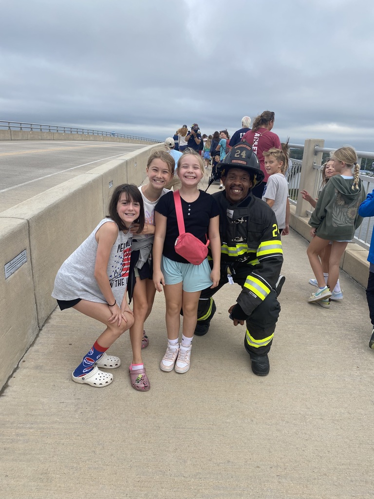 5th graders walking on surf City bridge