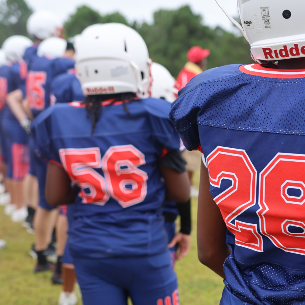 football players posing 