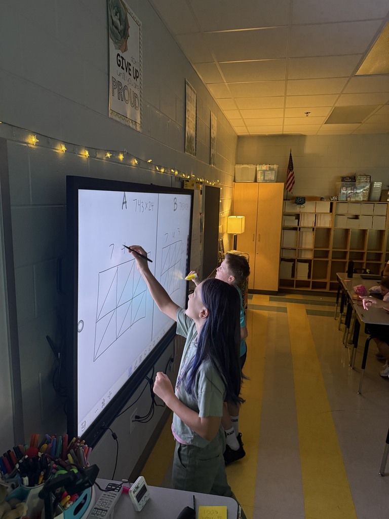 5th grade students playing a math game