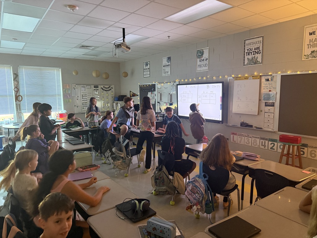 5th grade students playing a math game
