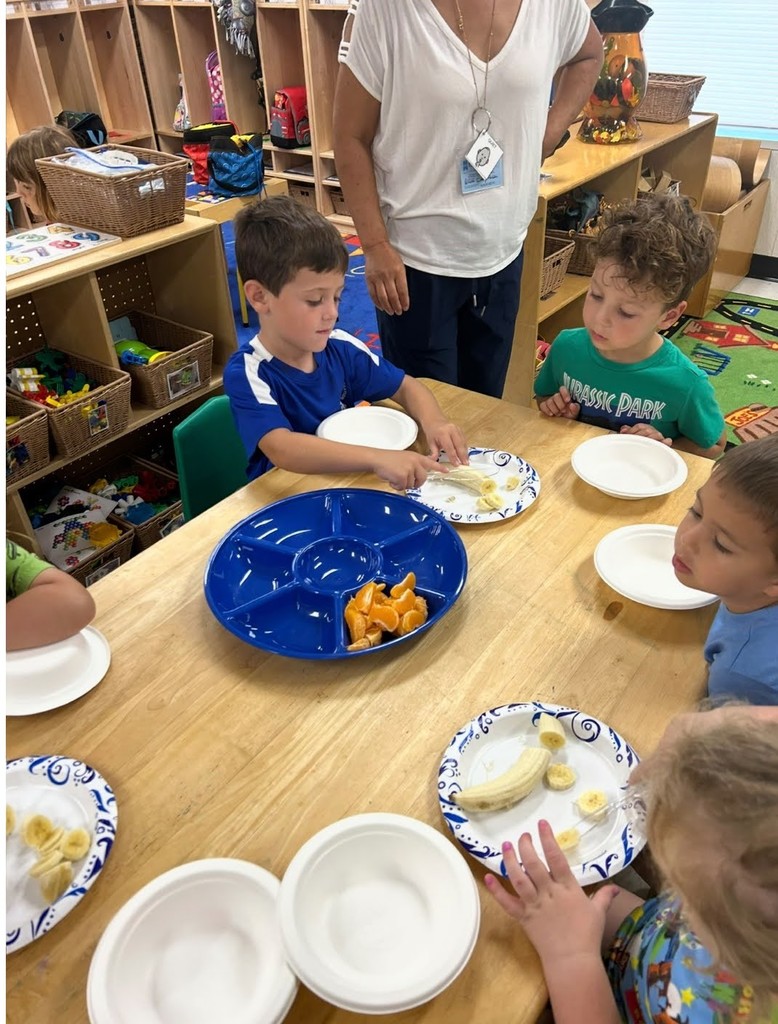 preK students making fruit salad