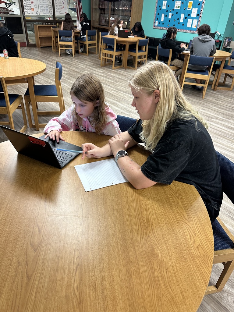 PECHS students tutoring Burgaw Middle School students