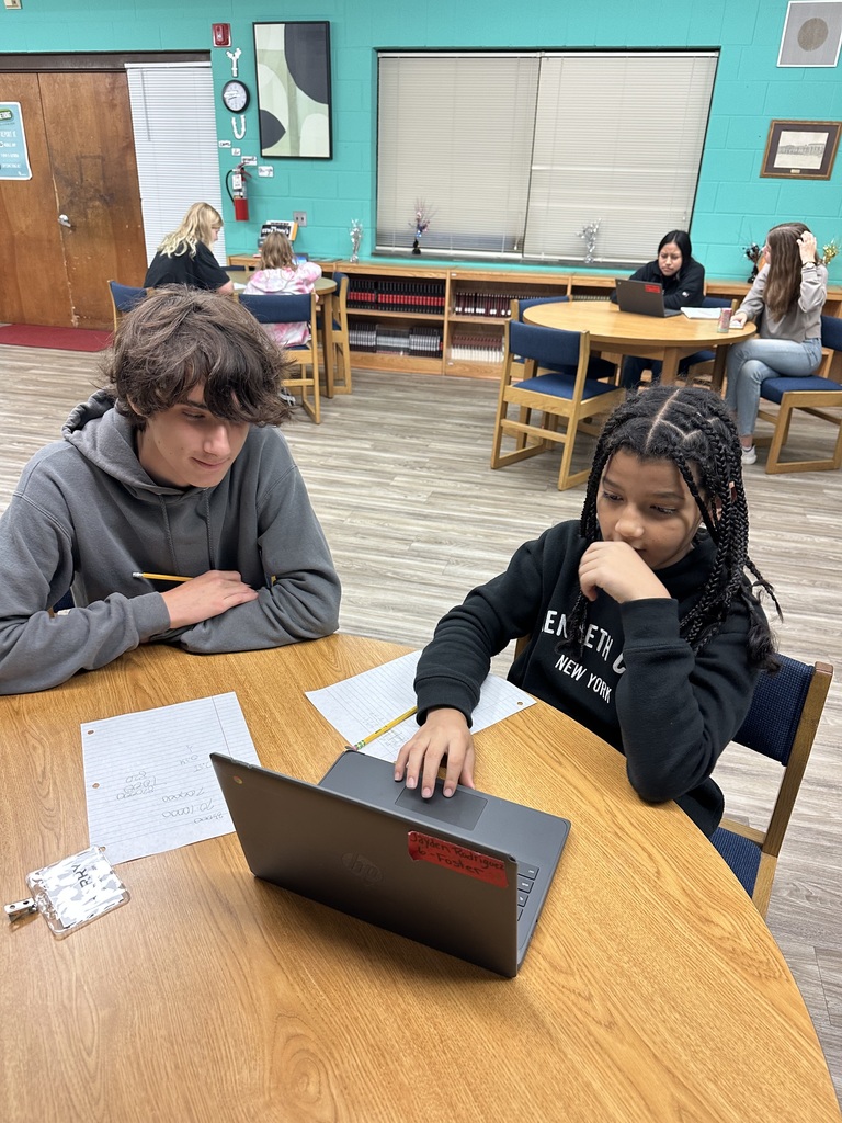 PECHS students tutoring Burgaw Middle School students