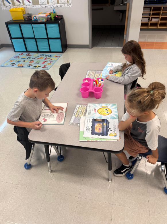 students independently reading in their classrooms
