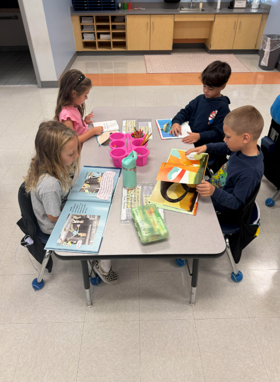 students independently reading in their classrooms