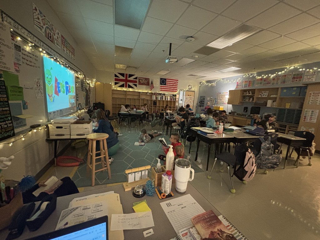 students independently reading in their classrooms