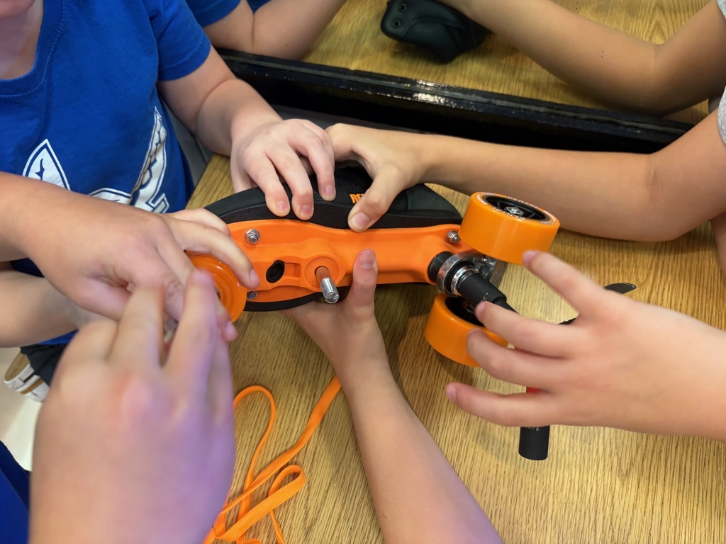 3rd graders working on a roller-skating STEM project