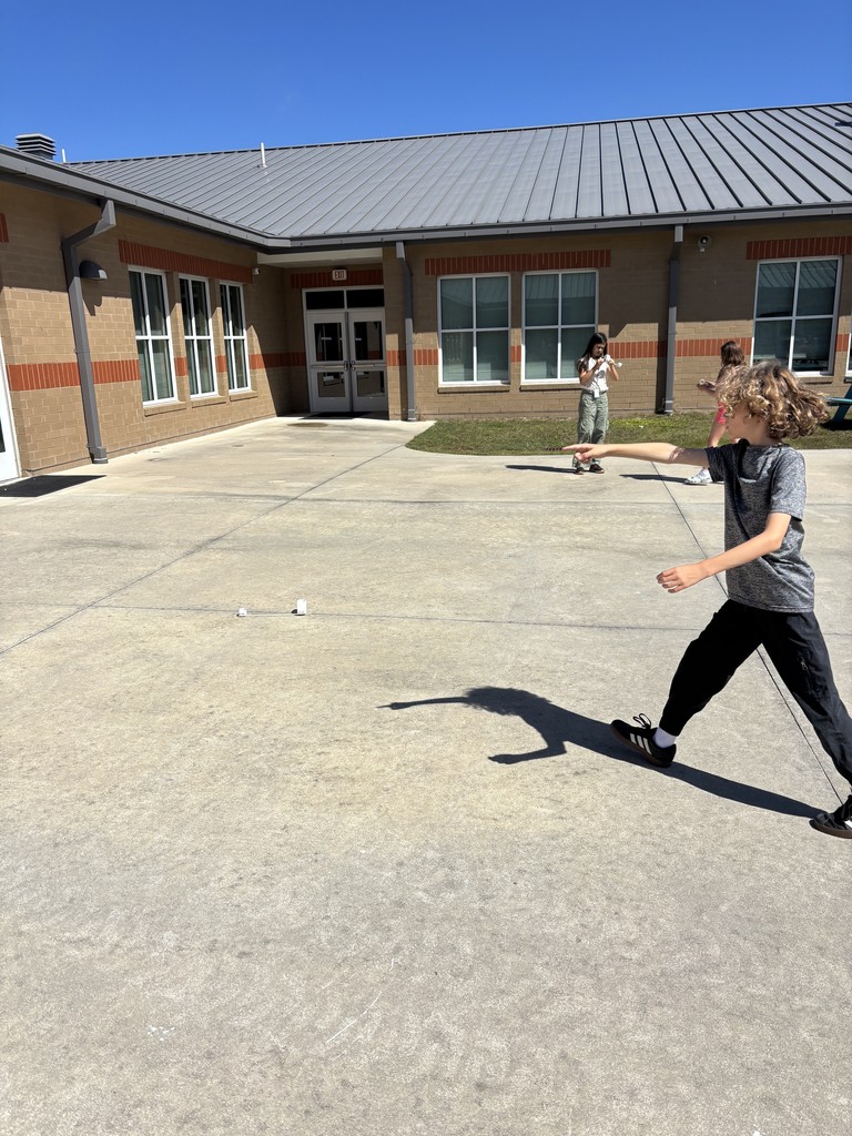 5th graders outside testing their hoop gliders
