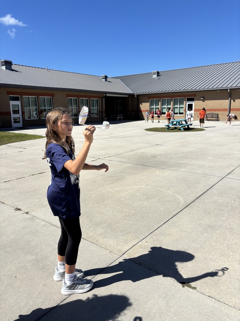 5th graders outside testing their hoop gliders