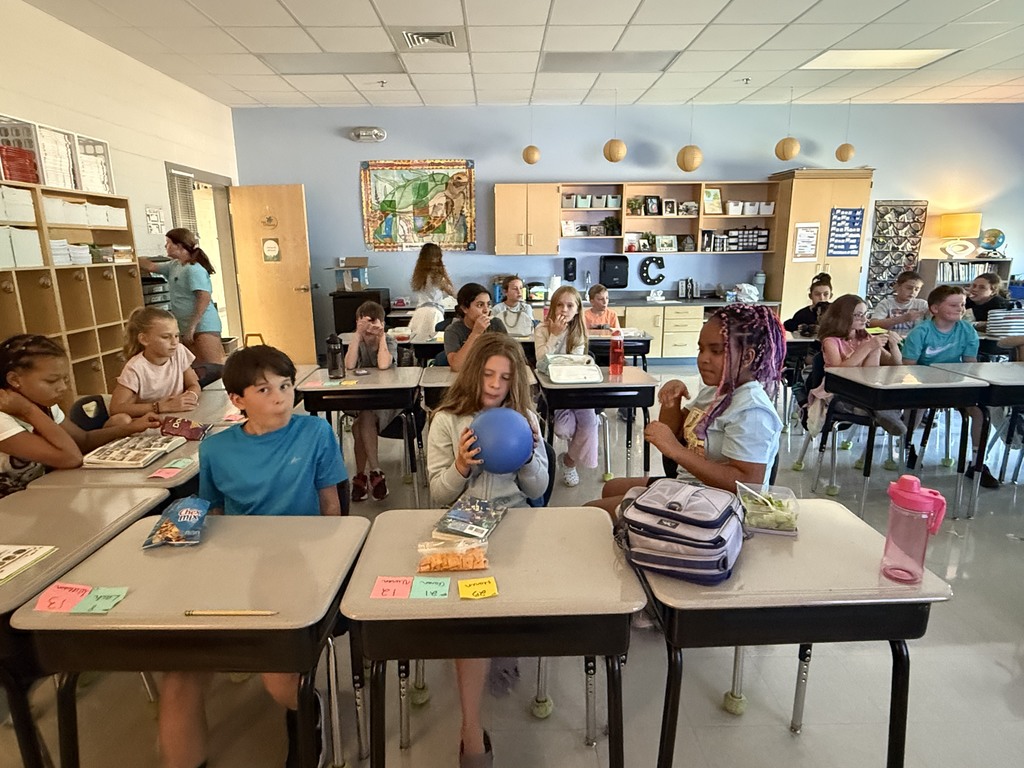 5th grade students using thet Q-ball during a class discussion