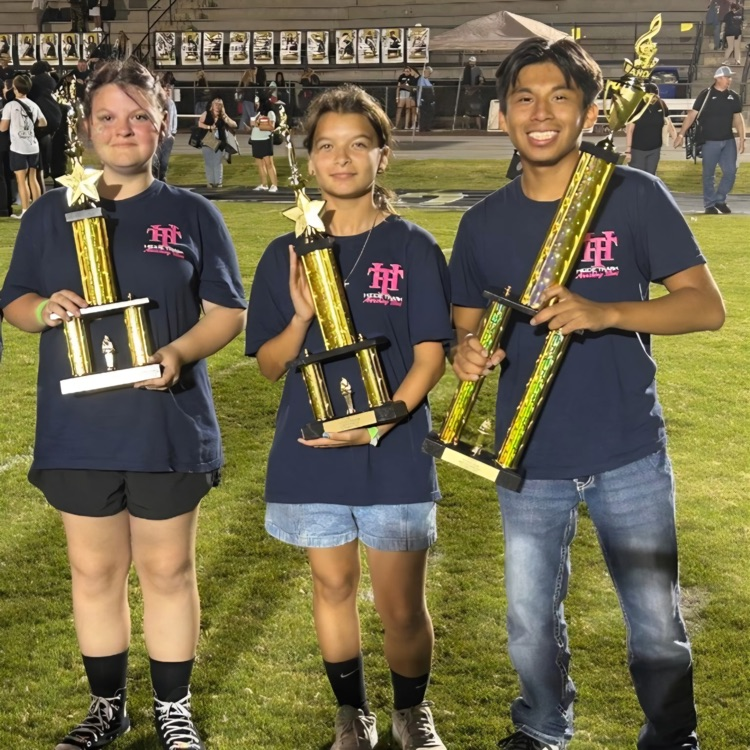 PECHS Students Gracie Karwoski, Natile Holtslander and Ricardo Vega Hernandez at band day