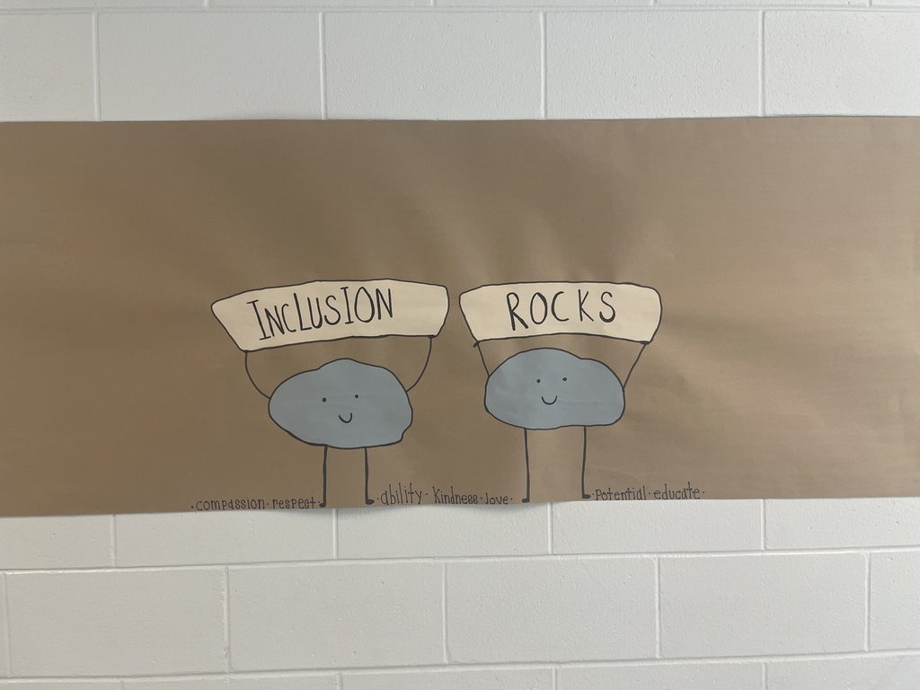 Inclusion rocks sign