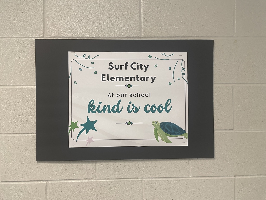 kind is cool sign hanging on the wall