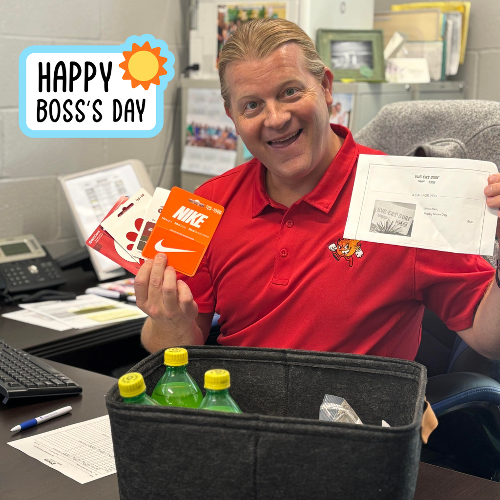 image of principal receiving gift on boss's day