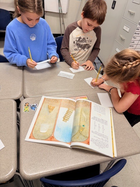 third graders working in small groups