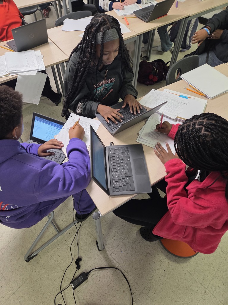 7th grade ELA students working on their literary analysis 