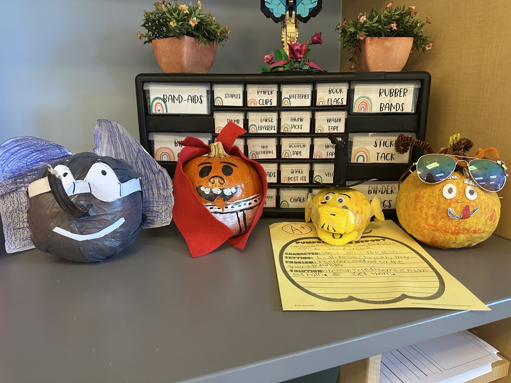 pumpkins decorated like story book characters
