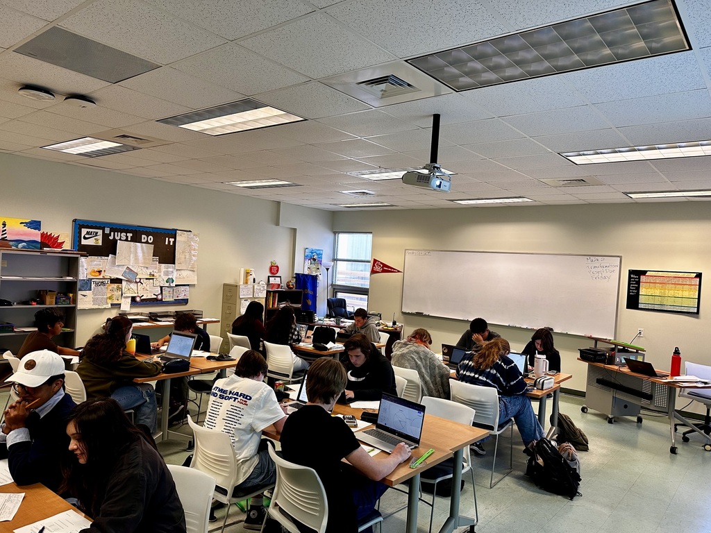 Students using Geometry software to explore relationships and measurements in circles