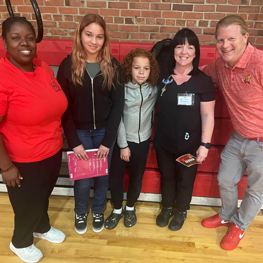 parents, students, and admin posing
